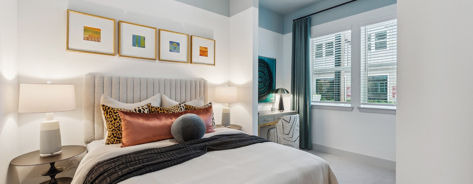 a bedroom with a bed and two nightstands