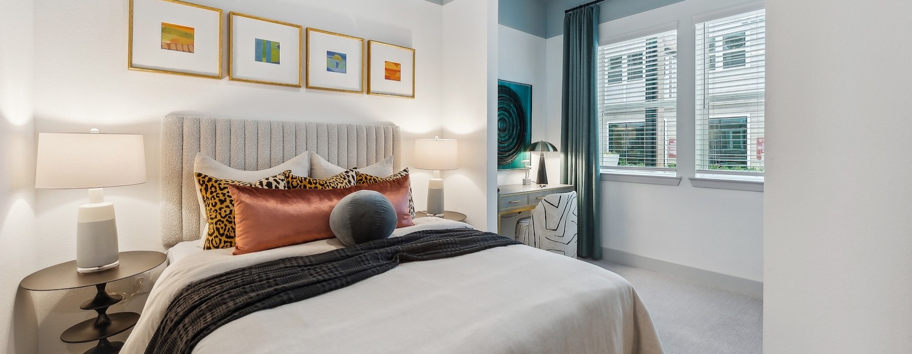 a bedroom with a bed and two nightstands
