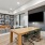 a clubhouse room with a table and chairs