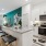 a kitchen with white cabinets